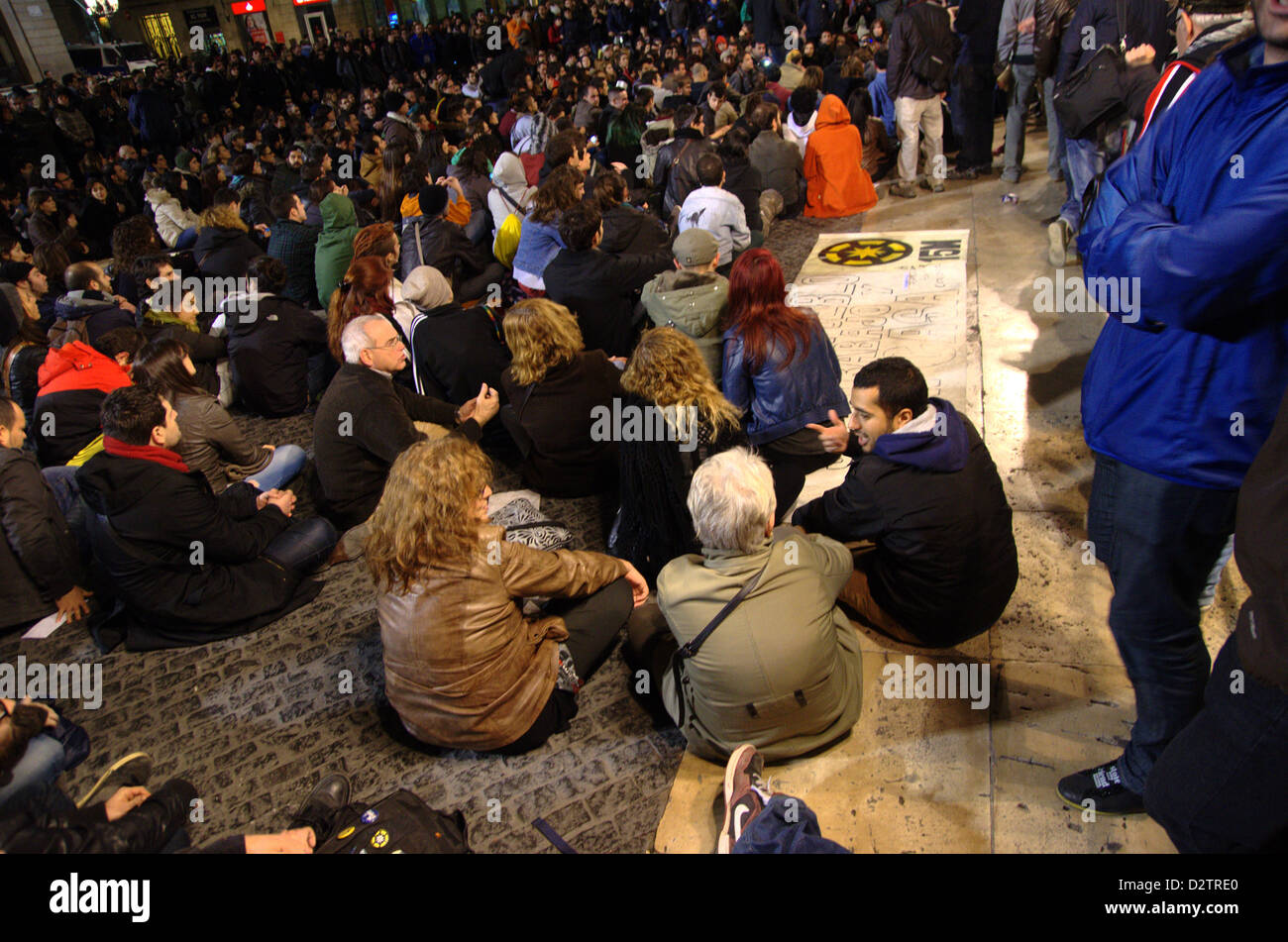 Demonstration of the 'indignados' tonight against secret bonuses in the spanish governtment and corruption. The demonstration ended in the Sant Jaume square of Barcelona. Stock Photo