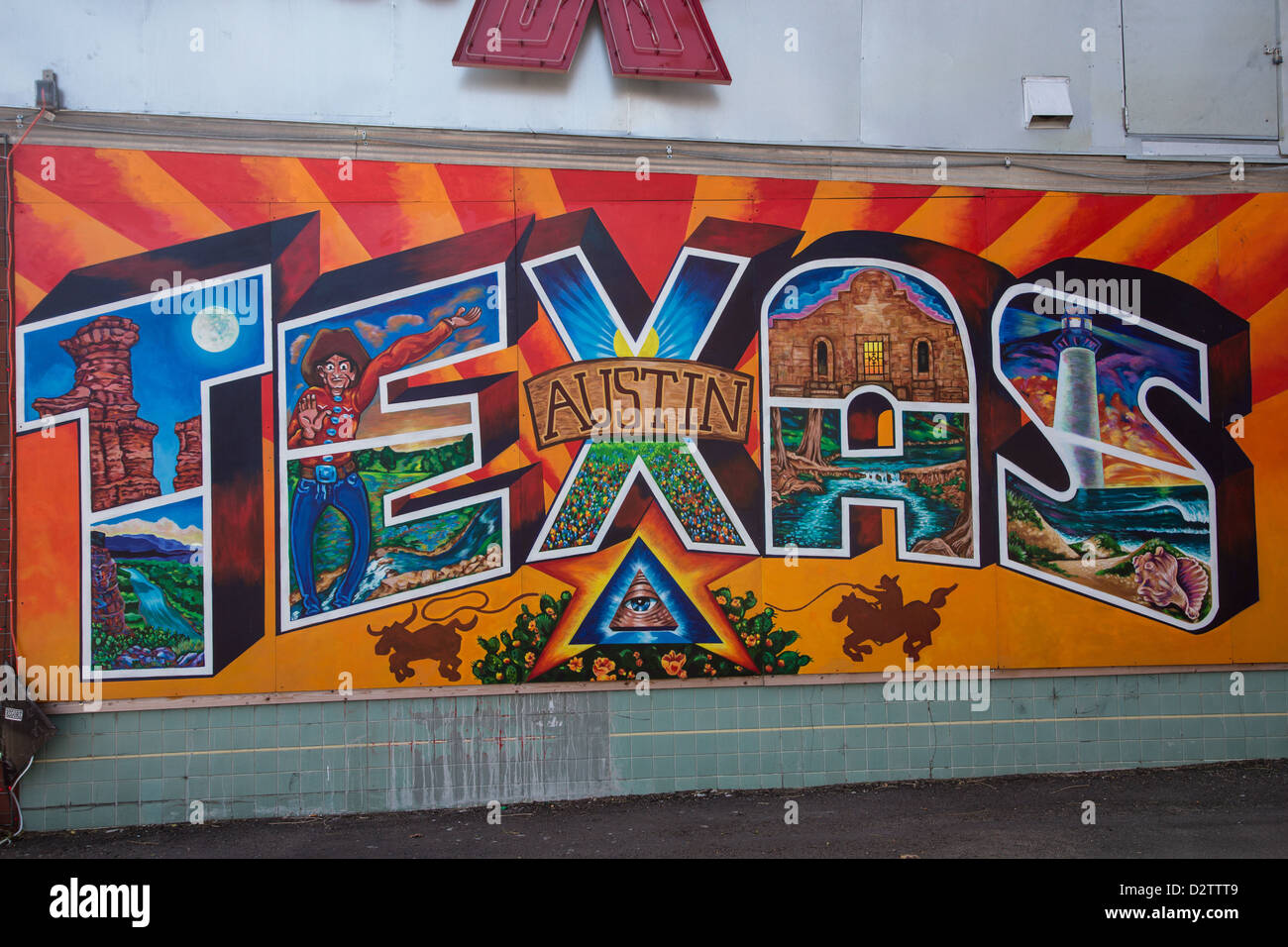 Colorful Texas Postcard Mural on the side of Planet K shop in Austin