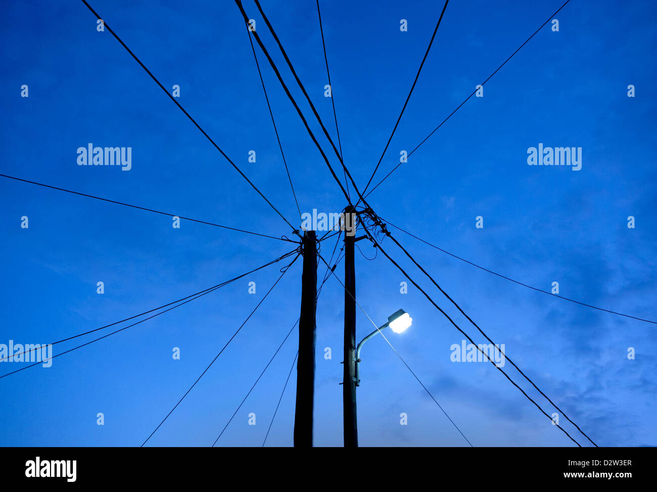 Power lines in the night sky Stock Photo - Alamy