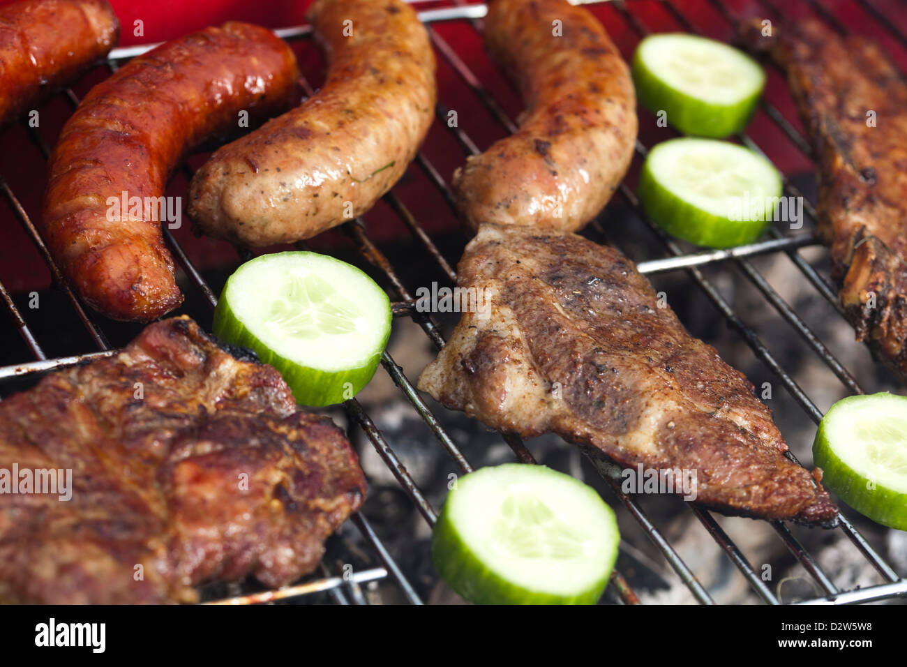 Closeup of meat on grill Stock Photo - Alamy