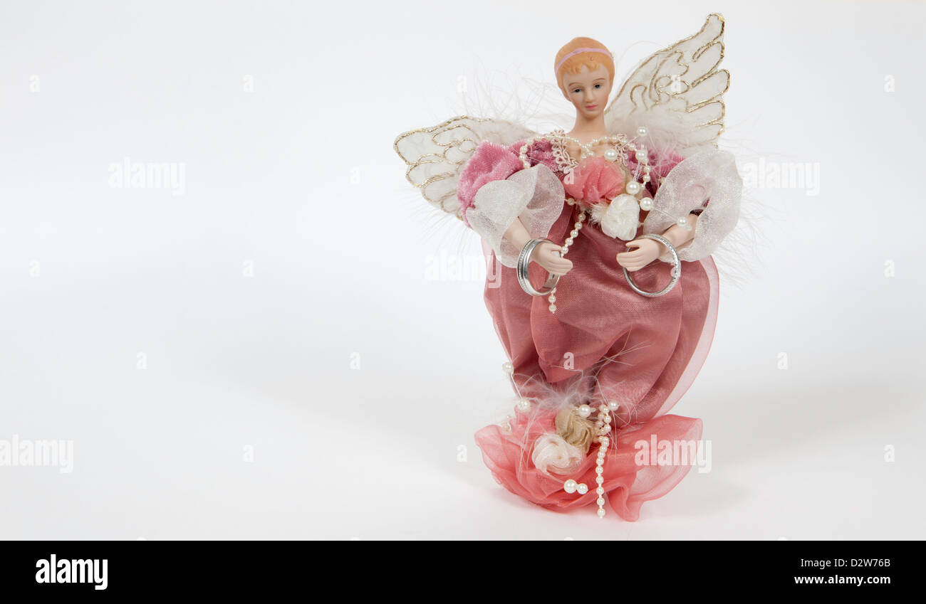 Angel and two silver rings Stock Photo - Alamy