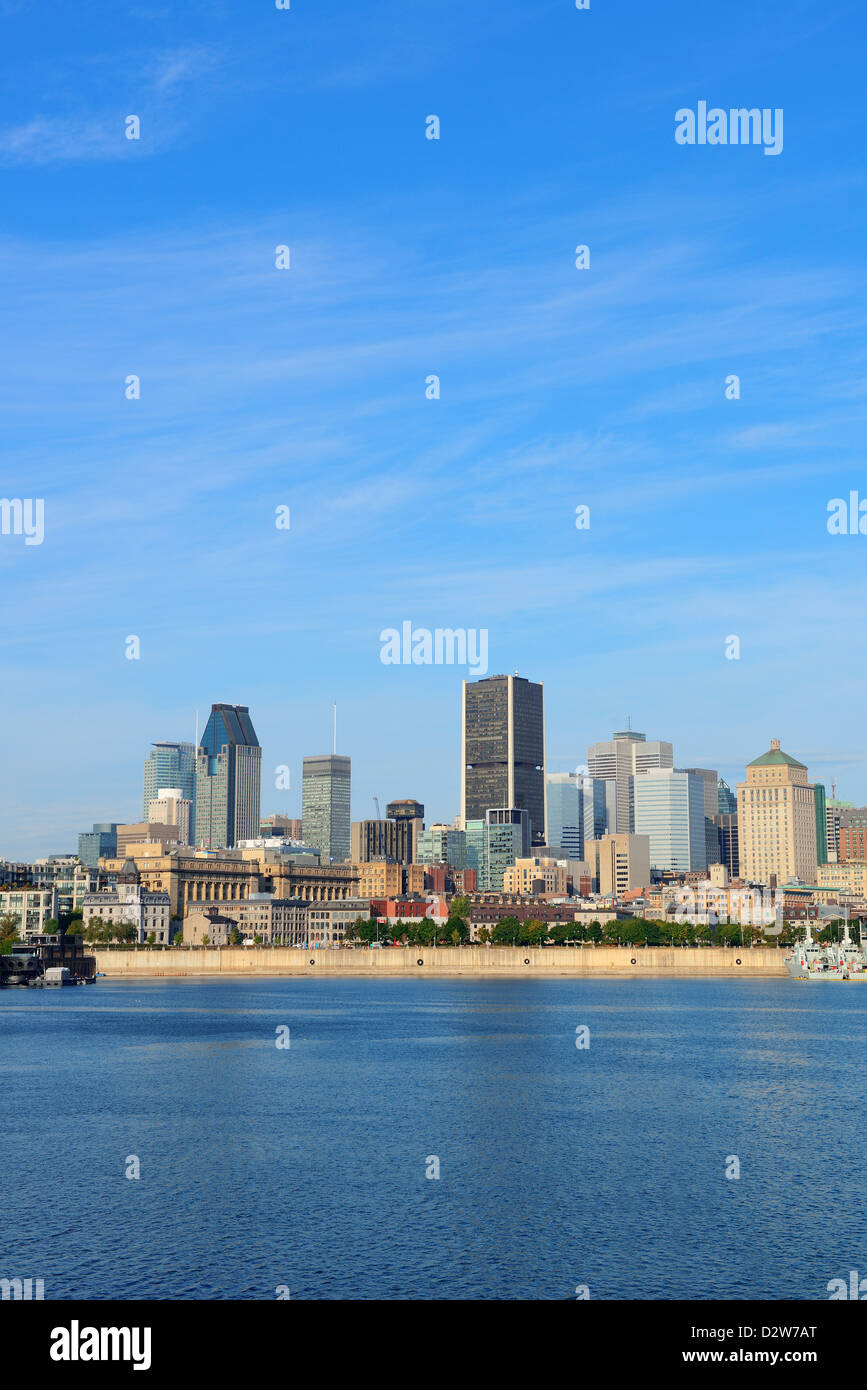 Montreal city skyline over river in the day with urban buildings Stock Photo