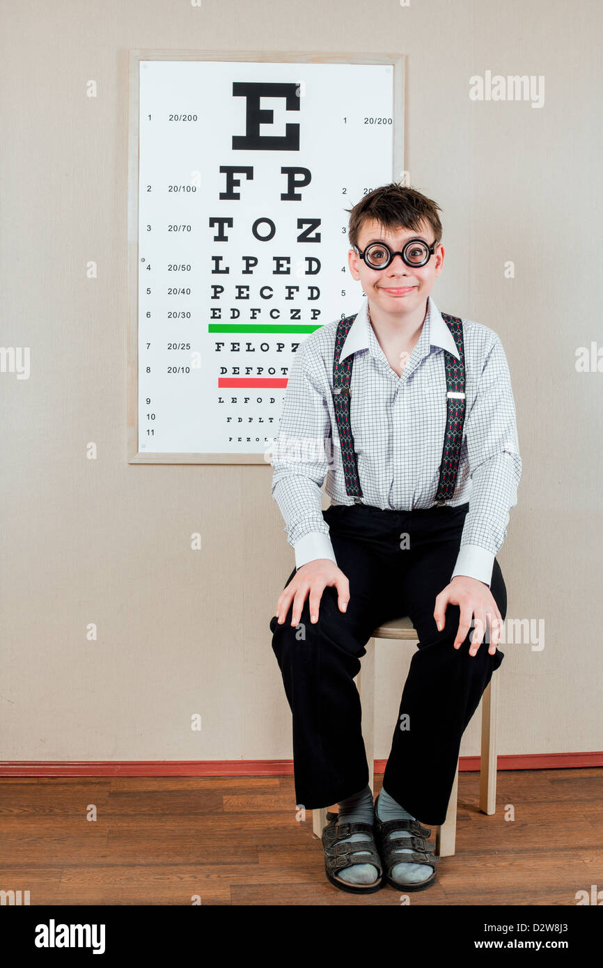 person wearing spectacles in an office at the doctor Stock Photo Alamy