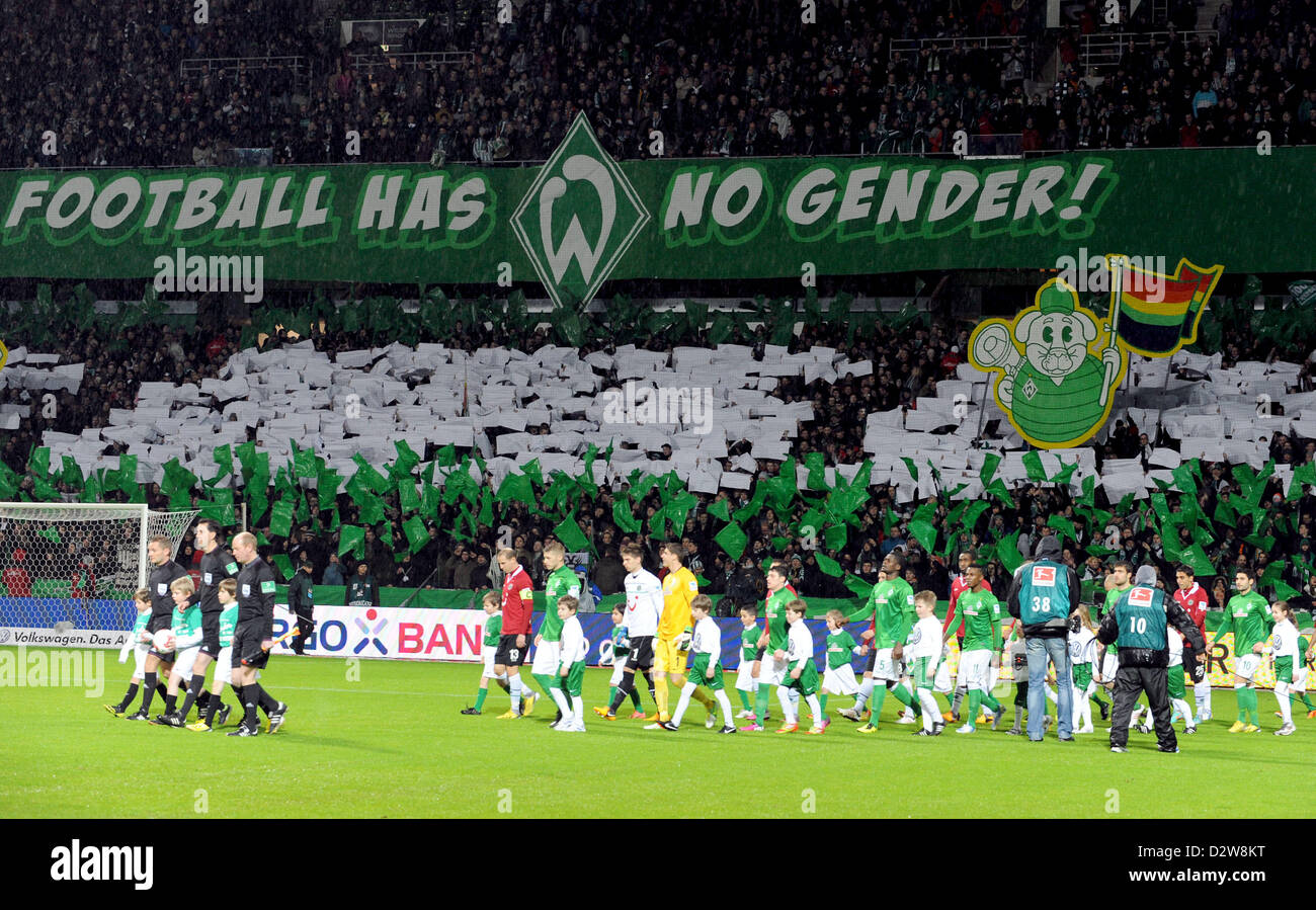 Fans of Werder perform a choreography and display a sign which reads 'Soccer has no Gender!' before the Bundesliga soccer match between Werder Bremen and Hannover 96 at Weser Stadium in Bremen, Germany, 01 February 2013. Photo: Carmen Jaspersen Stock Photo