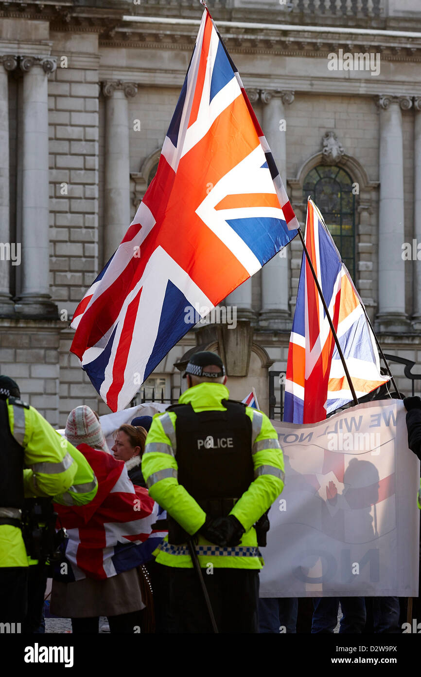 Belfast city hall flag protest union flag loyalist hi-res stock