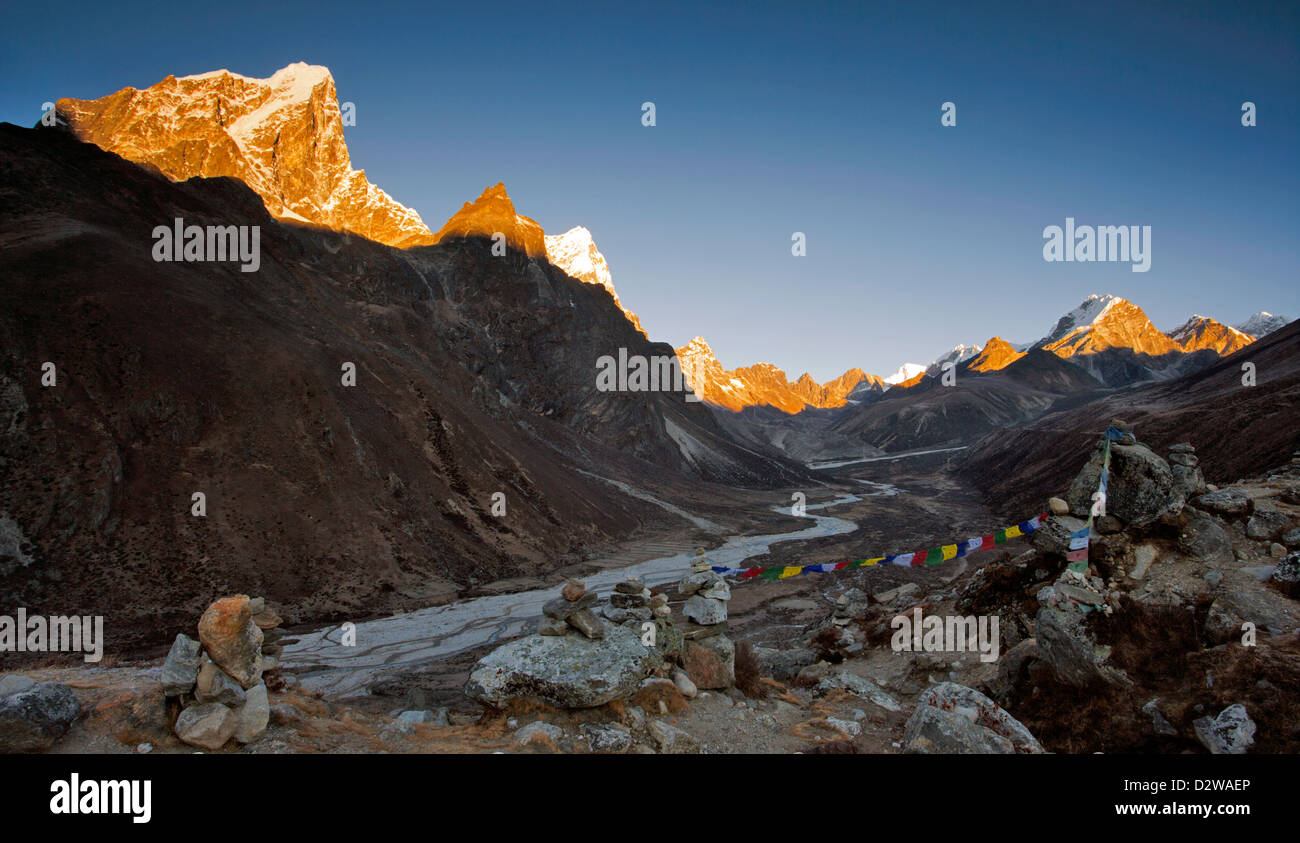 Taboche (6367m) and Cholatse (6335m) peaks in the Chola valley near Dingboche at sunrise in Nepal. Stock Photo