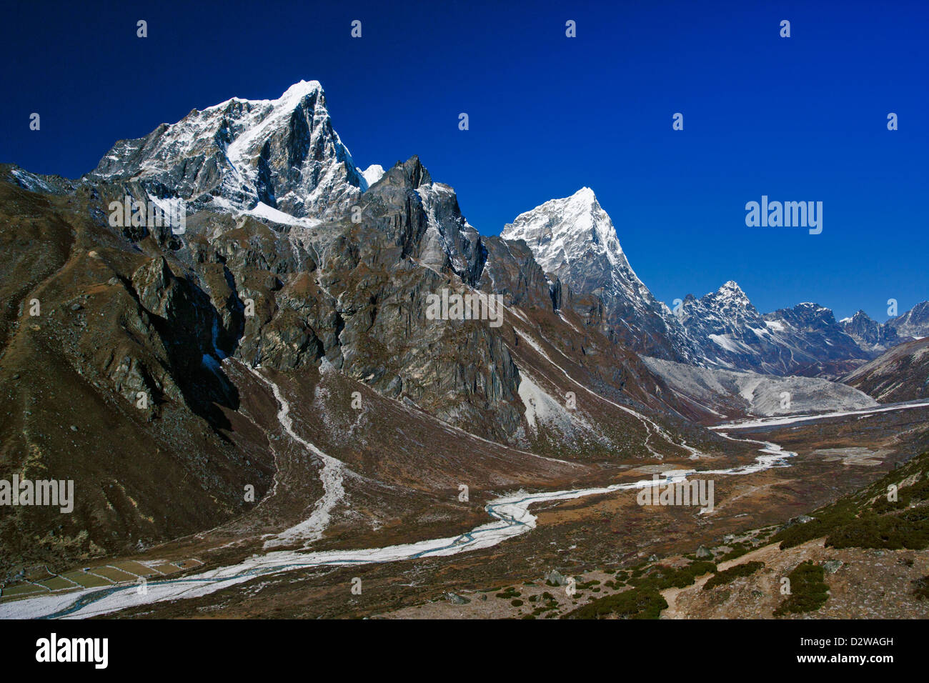 Taboche (6367m) and Cholatse (6335m) peaks in the Chola valley near Dingboche, Nepal. Stock Photo