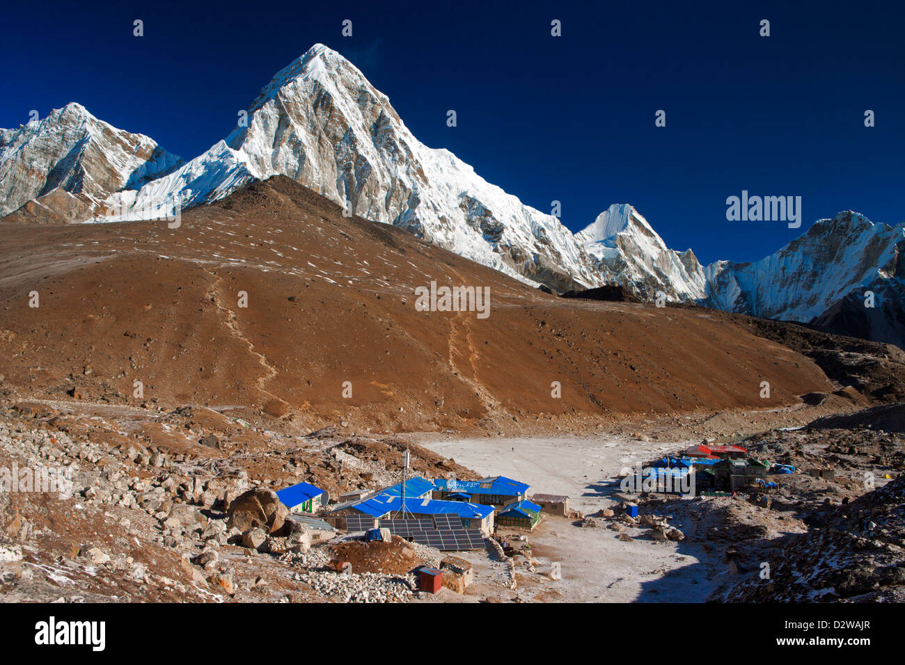 Gorak Shep lodges (5164m) with Mt. Pumori (7165) and Kala Patthar (5550m) on the background, in Sagarmatha NT Park, Nepal. Stock Photo