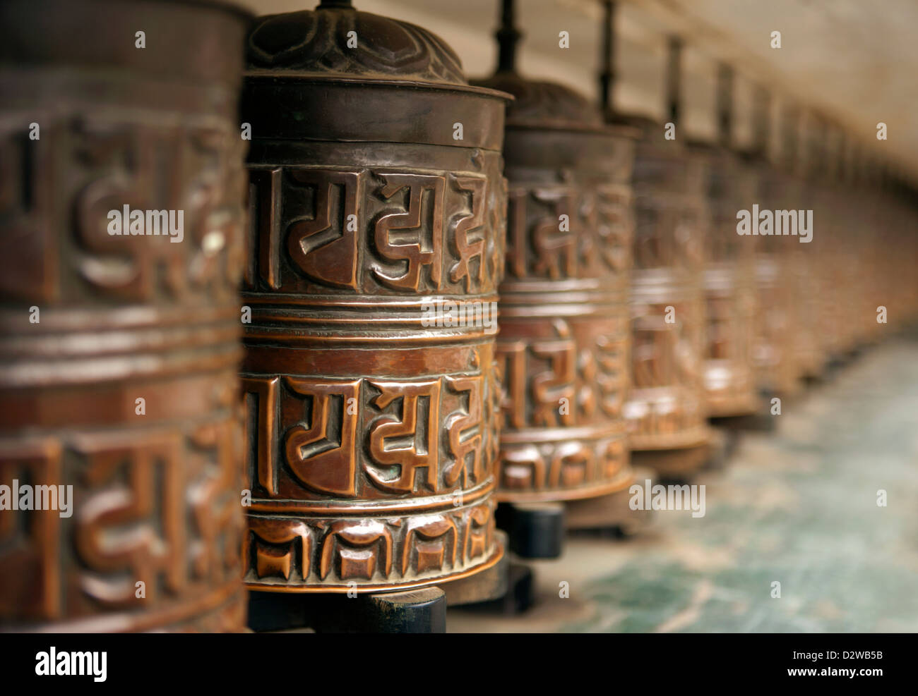 Prayer wheels at the Swayambhunath Temple in Kathmandu, Nepal. Stock Photo