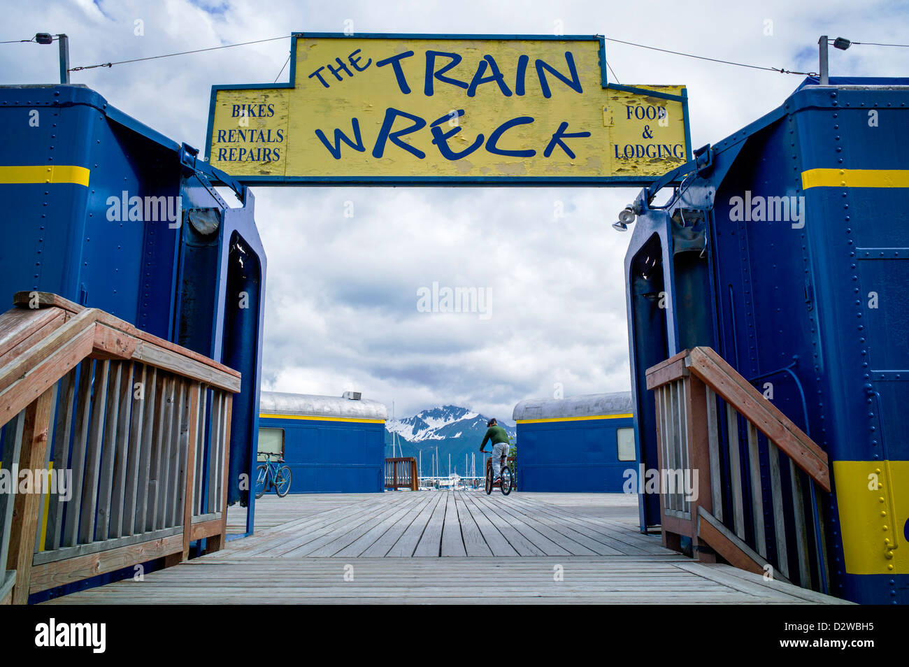The Train Wreck, collection of refurbished railcars from Alaska Railroad now house The Smoke Shop cafe, and Seward Bike Shop, AK Stock Photo