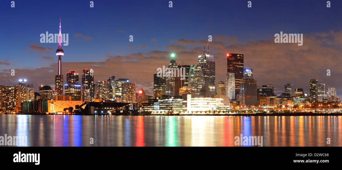 Toronto cityscape panorama at dusk over lake with colorful light Stock ...