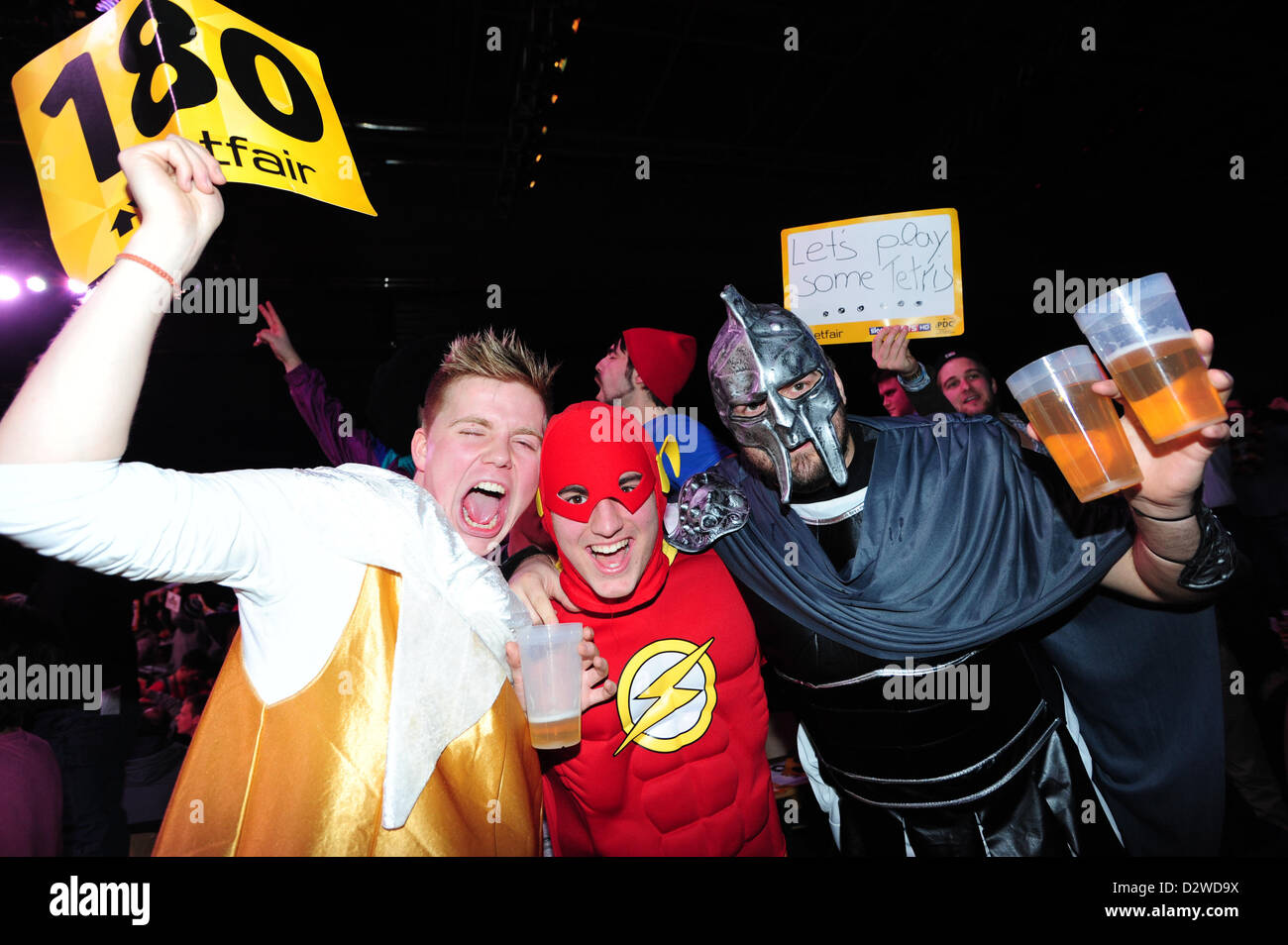Dart fans celebrate at the 2013 Betfair World Cup of Darts at Sporthalle Hamburg in Hamburg