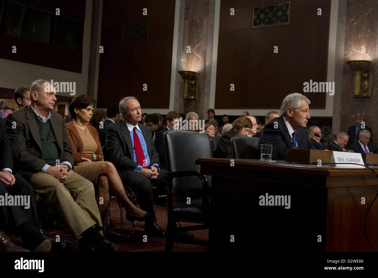 Former Senator Chuck Hagel during his confirmation hearing as the Secretary of Defense as his wife, Lilibet and brothers look on in the Senate Armed Service Committee January 31, 2013 in Washington, DC. Stock Photo