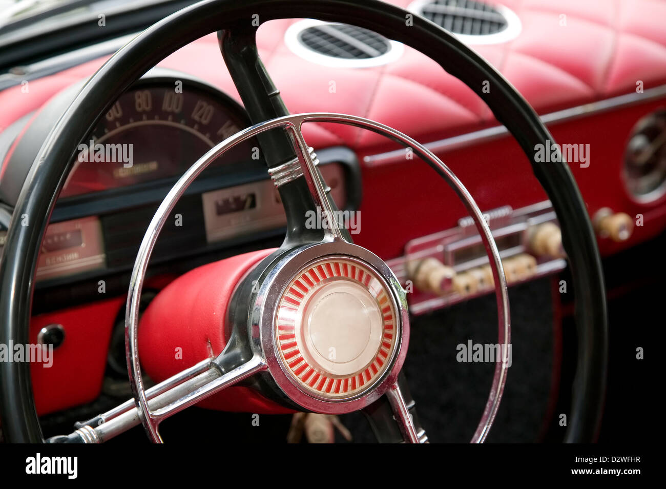 Antique Car With Red Interior Inside And Old Black Wheel