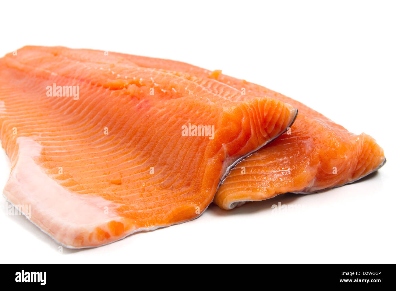detail of salmon trout fillets over white background Stock Photo