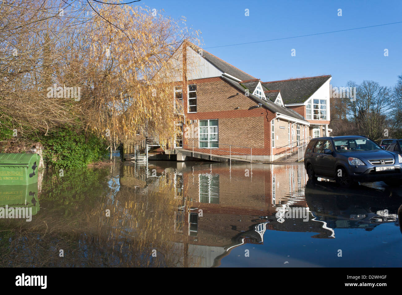 Flooded car park at a NHS GP surgery Stock Photo