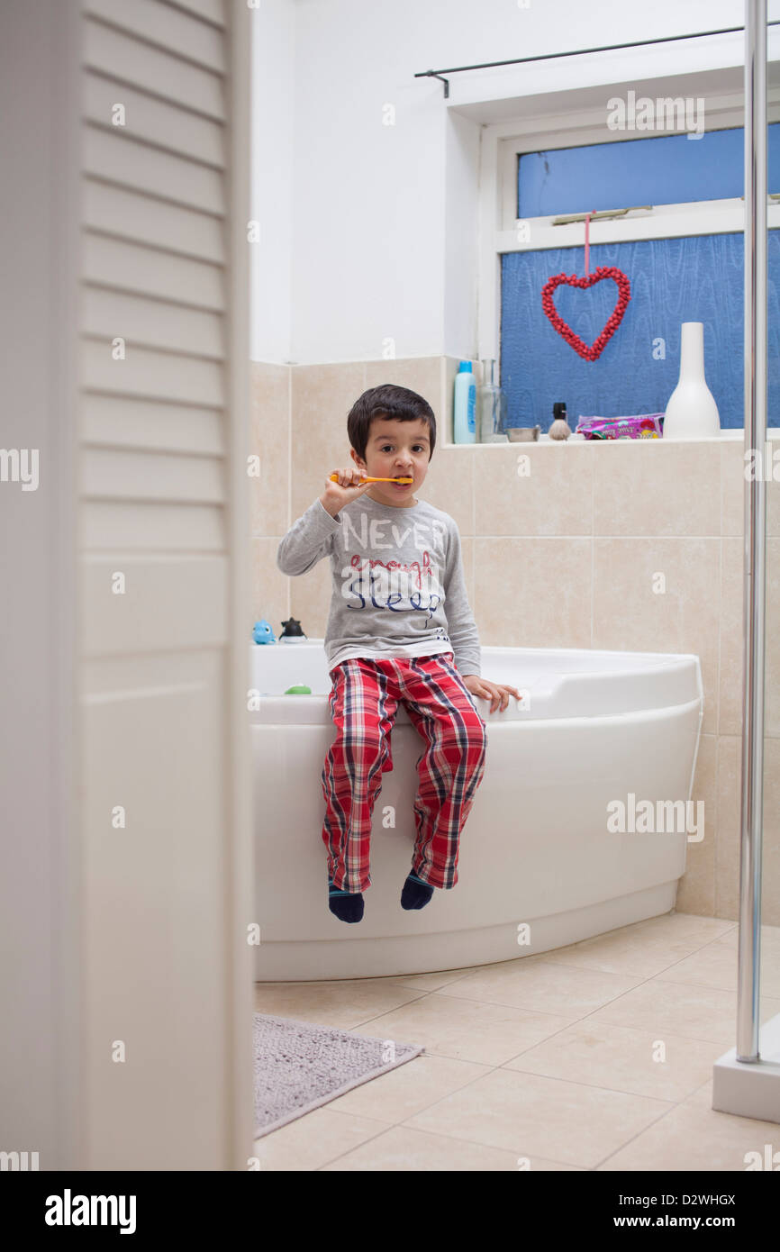 Boy,brushing his teeth in the morning Stock Photo