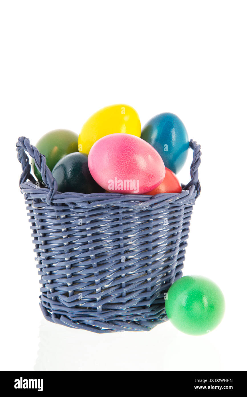 Colorful easter eggs in basket isolated over white background Stock ...