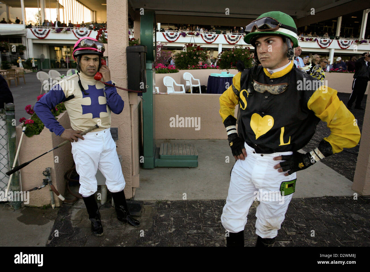 Feb. 2, 2013 - Oldsmar, Florida, U.S. - Falling Sky jockey LUIS SAEZ (L) talks to officials as Speak Logistics jockey ANGEL SERPA (R) waits to state his point of view after a protest of interference in the $250,000 Sam F. Davis Stakes at Tampa Bay Downs. Eventually the protest was dismissed and Falling Sky took the win. (Credit Image: © Daniel Wallace/Tampa Bay Times/ZUMAPRESS.com) Stock Photo