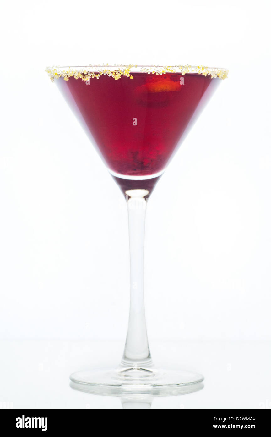 Purple mixed drink in martini glass with lemon sugar rim Stock Photo