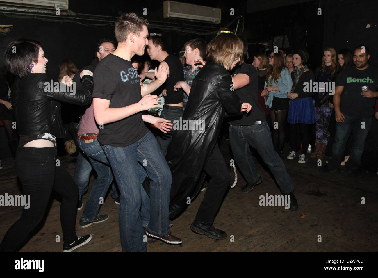 Guys in the mosh pit, Bristol based band AWMR playing at The Croft in Bristol. Stock Photo