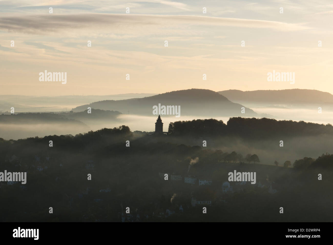 View of Eisenach with the Fraternity Monument and the Thuringian Forest in the morning mist, Eisenach, Thuringia, Germany, Europ Stock Photo