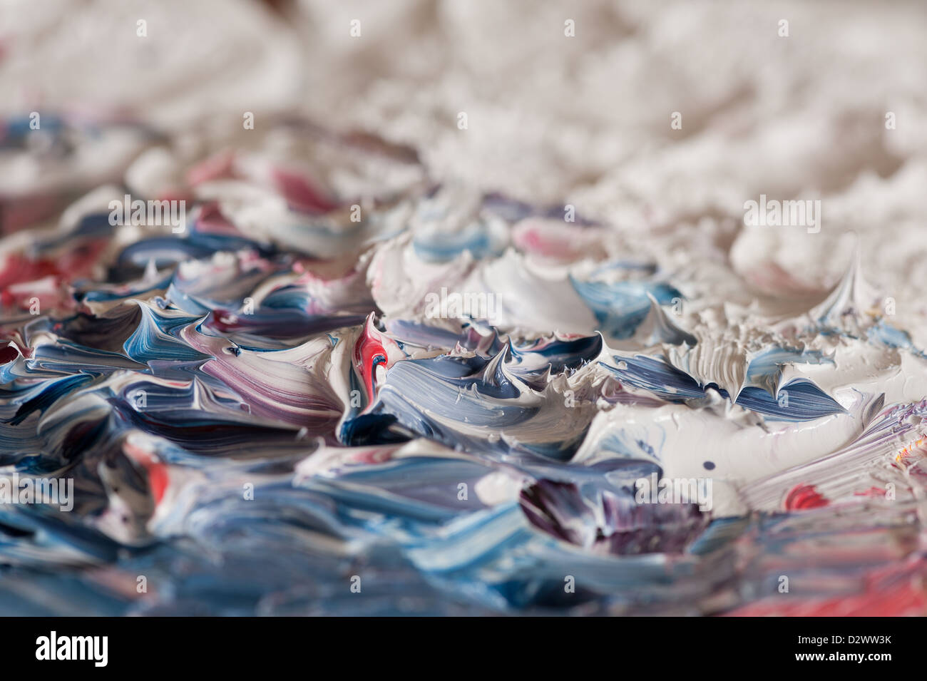 impasto detail of oil paint brush strokes and pallet knife in a thick