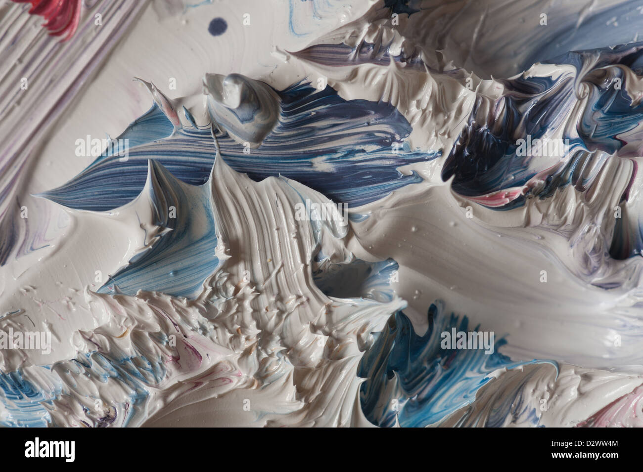 impasto detail of oil paint brush strokes and pallet knife in a thick