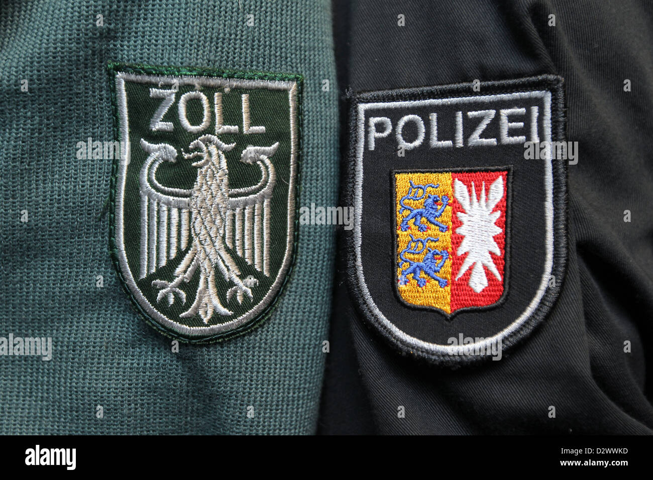 Tarp, Germany, Schleswig-Holstein Coat of police and customs on sleeves Stock Photo