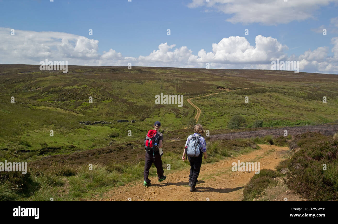 Walkers on the track from Armouth Wath to Baysdale in the North York Moors. Stock Photo