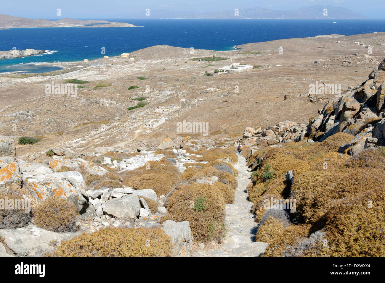 Delos. Greece. Broad view of archaeological site and the stone cut staircase that gives access to the summit of Mount Kynthos. Stock Photo