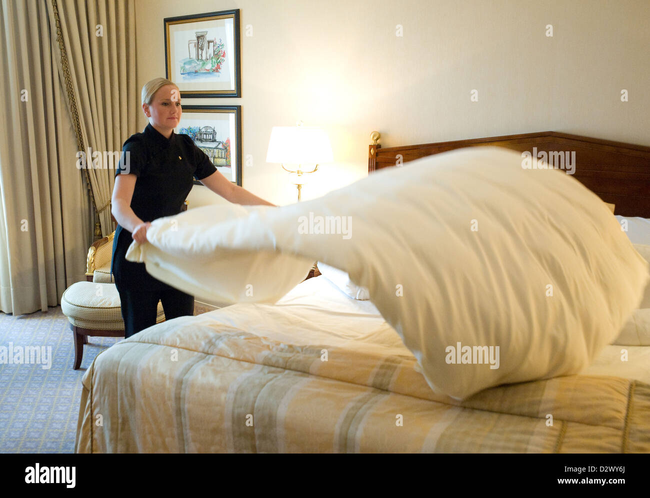 Berlin, Germany, Maid makes the beds in a hotel room Stock Photo Alamy