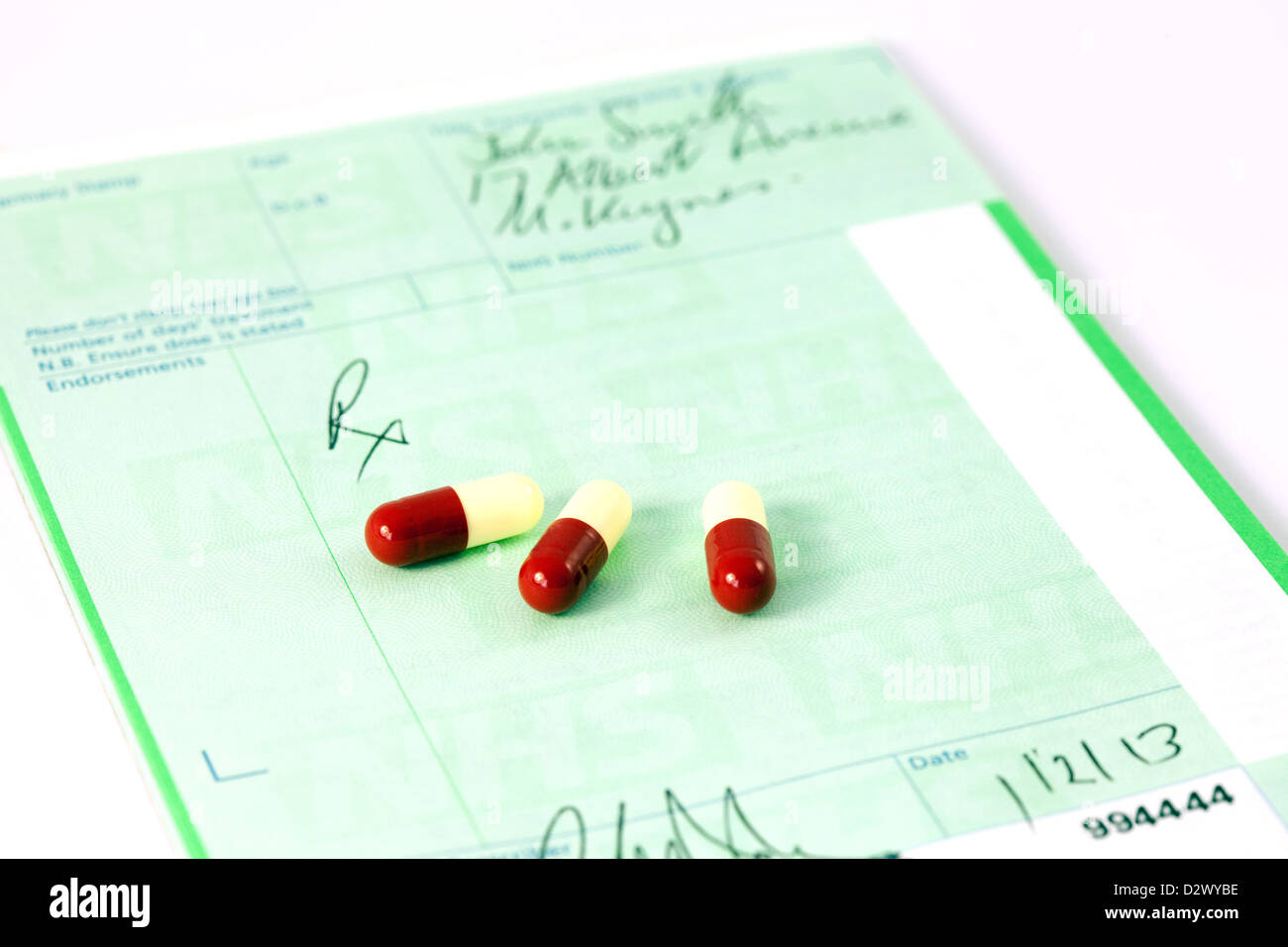 An NHS Prescription pad and drugs - the concept of prescription drugs, England UK Stock Photo