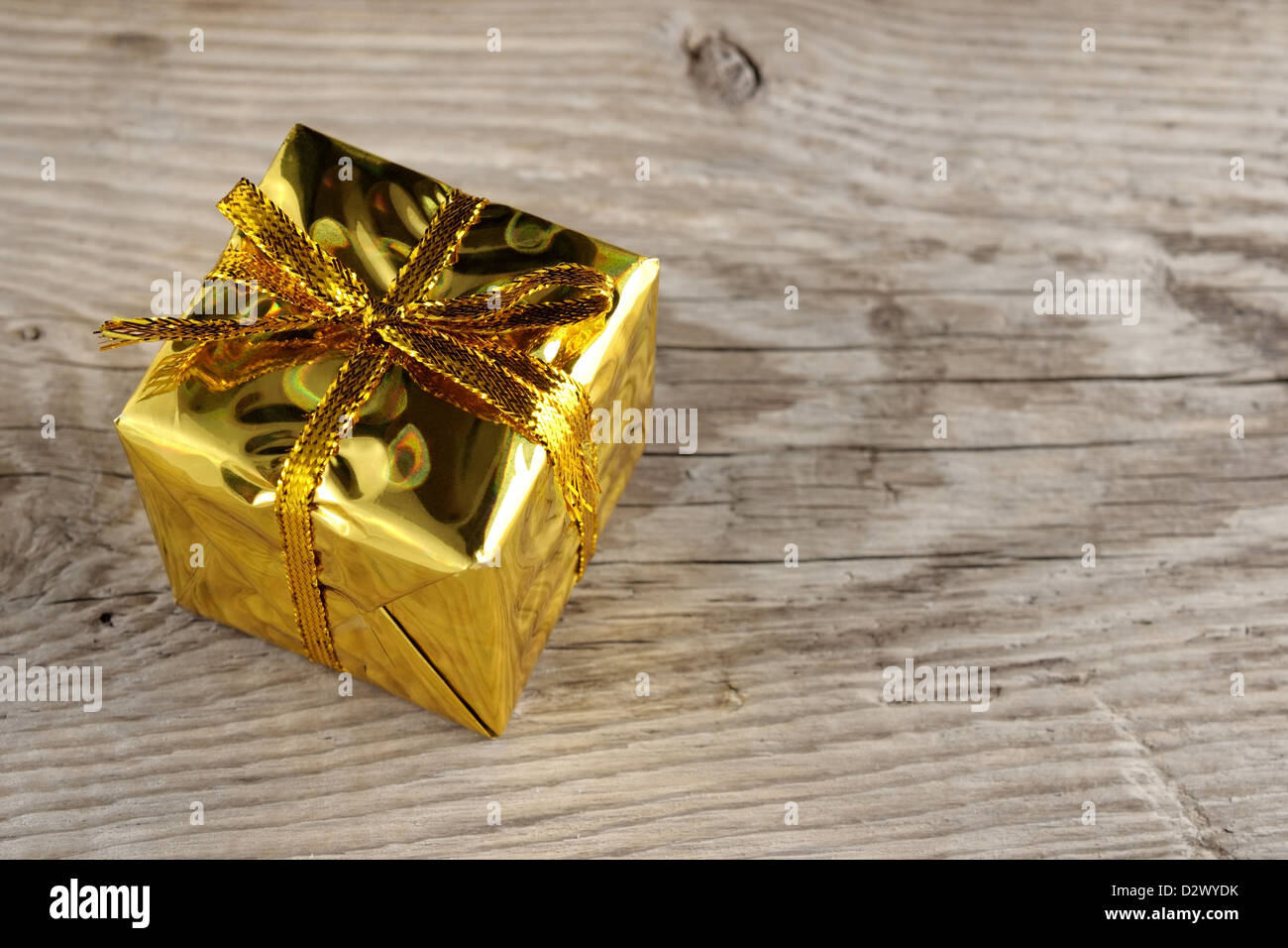 Gold gift box wooden hi-res stock photography and images - Alamy
