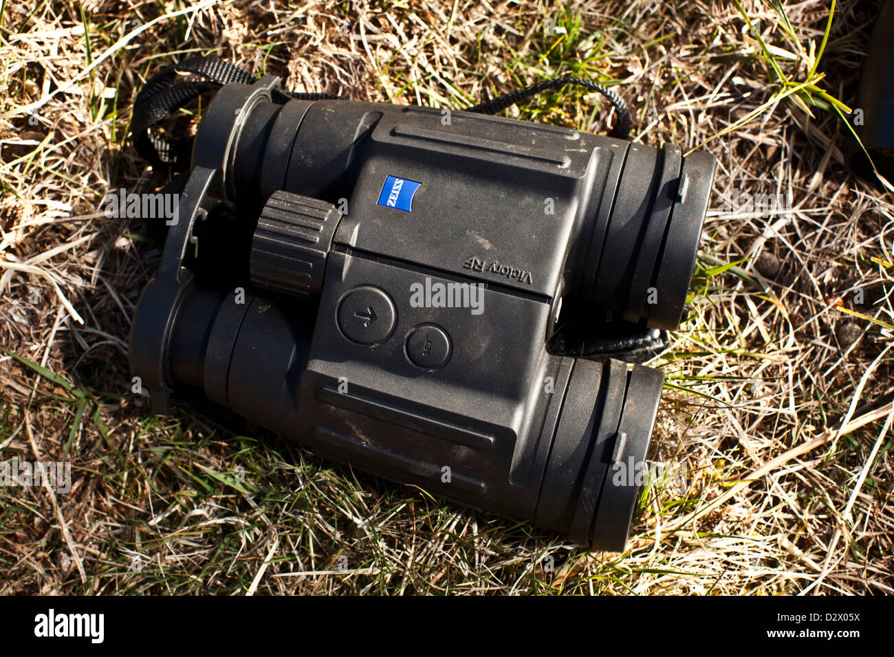 Deer hunting binoculars on grass in Thetford forest, UK Stock Photo