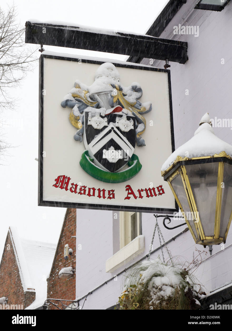 Masons Arms pub, Solihull High Street, West Midlands covered in snow, winter 2013 Stock Photo