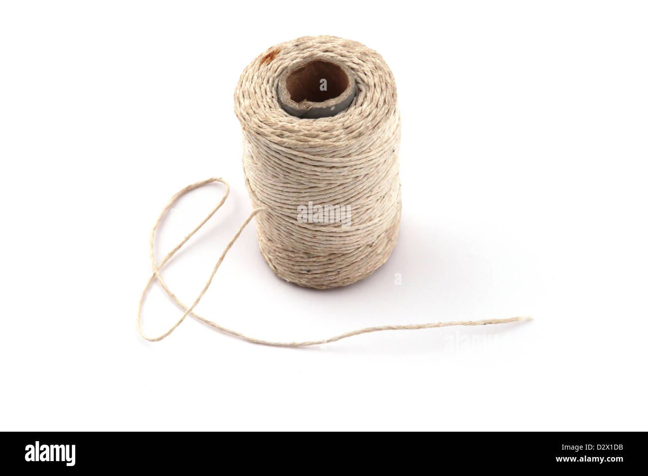 Ball of string or twine on a plain white background Stock Photo