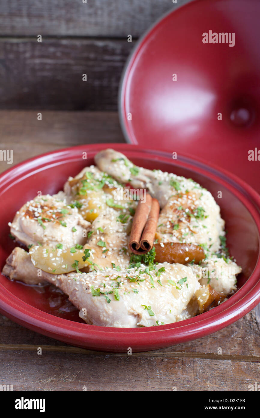 Classic Moroccan chicken tagine with caramelized pears, cinnamon and