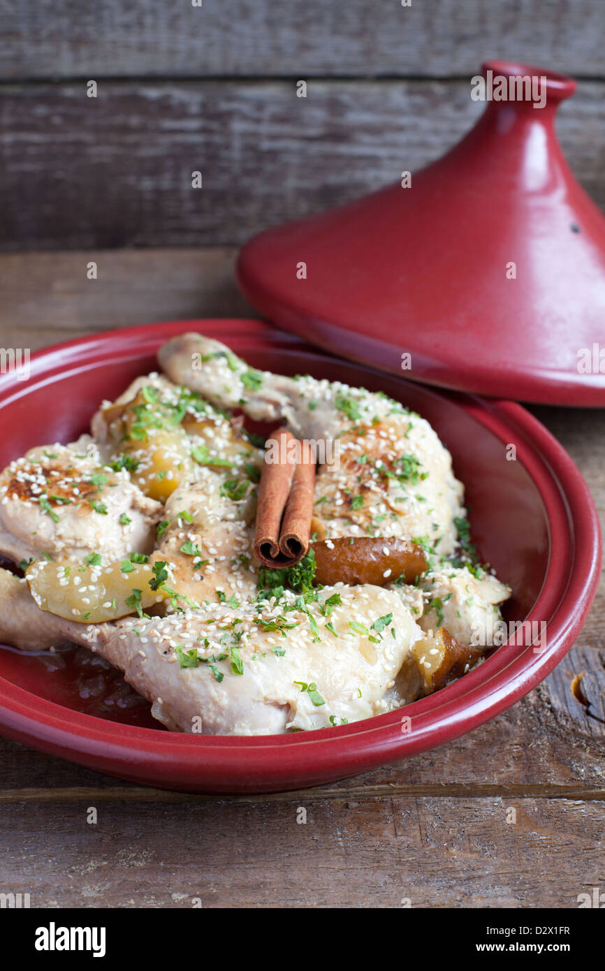 Classic Moroccan chicken tagine with caramelized pears, cinnamon and