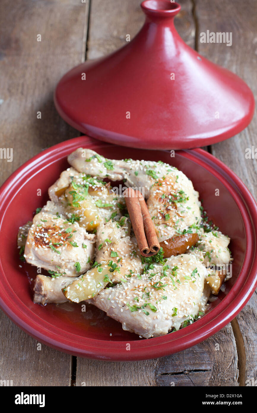 Classic Moroccan chicken tagine with caramelized pears, cinnamon and