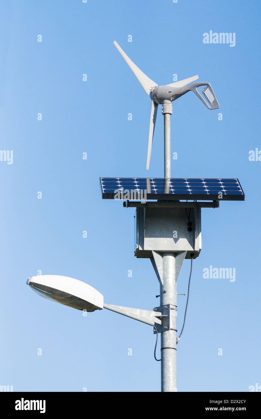 A combined wind turbine and solar panel powered street light seen at