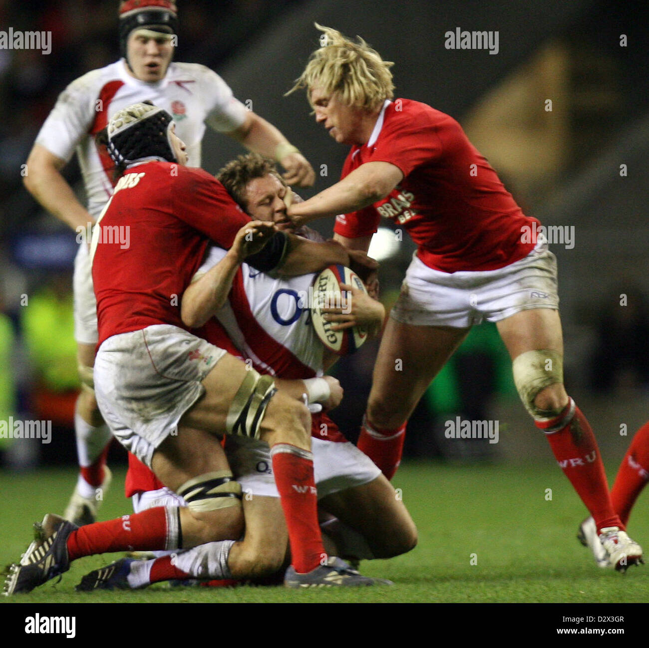 England S Jonny Wilkinson Gets Caught By Wales Captain Ryan Jones Stock Photo Alamy