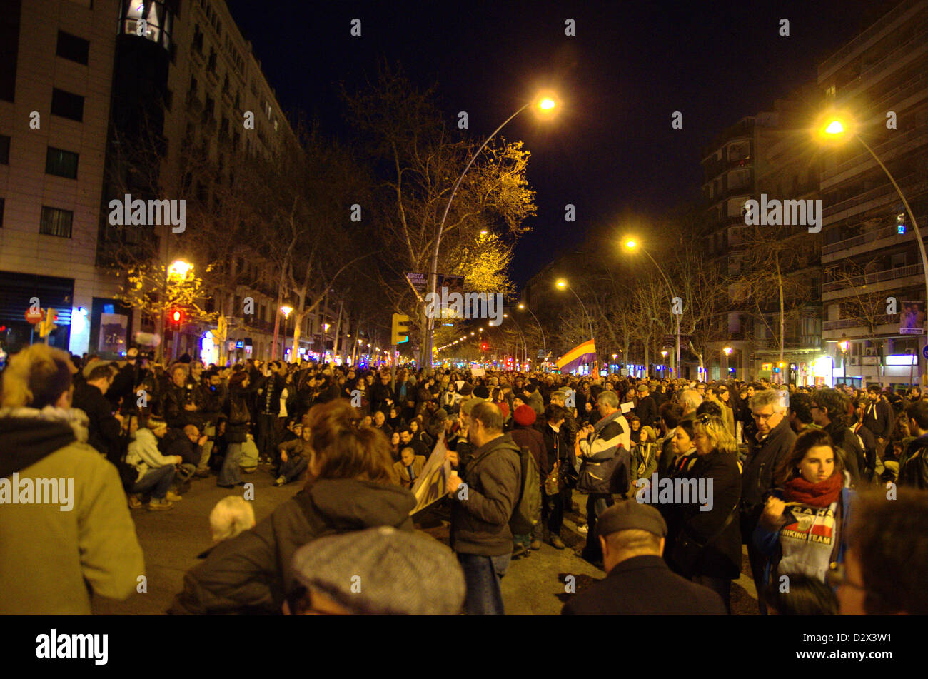 Demonstration of the 'indignados' the night of 2nd Februart against secret bonuses in the spanish governtment and corruption. The demonstration ended in front of the Partido Popular headquarters in Barcelona. The protests begins in Plaça Catalunya. Stock Photo
