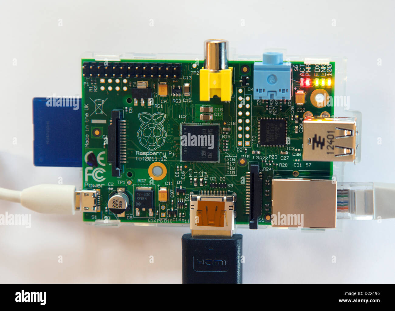 A Raspberry Pi Model B credit card sized computer switched on with cables  and memory card Stock Photo - Alamy