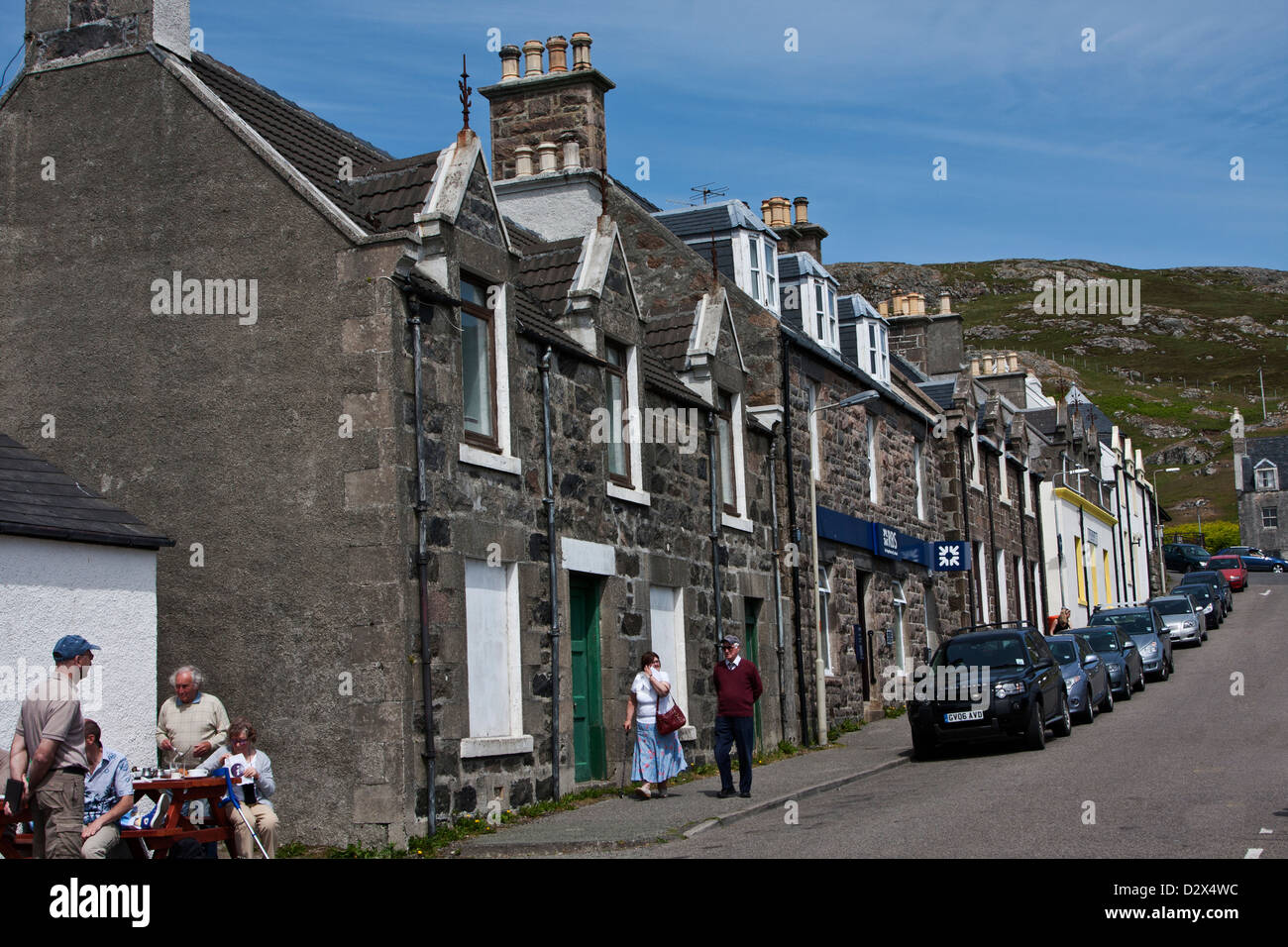 Stone houses line the main street of Castlebay on the Isle of Barra