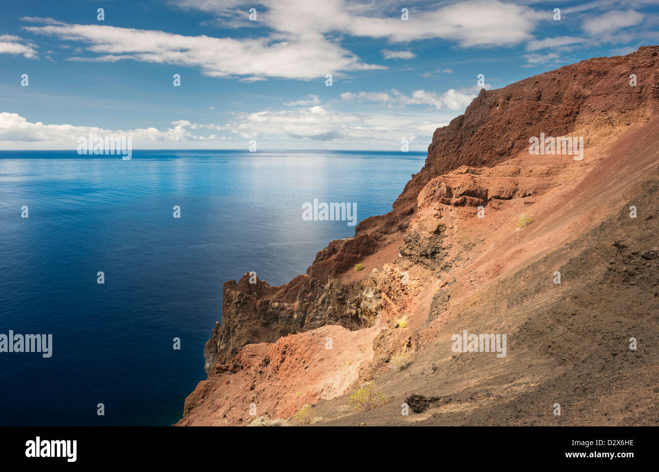 The red volcanic cone of Montana Puerto de Naos, on the south coast of El Hierro, overooking Mar de las Calmas (sea of calm) Stock Photo