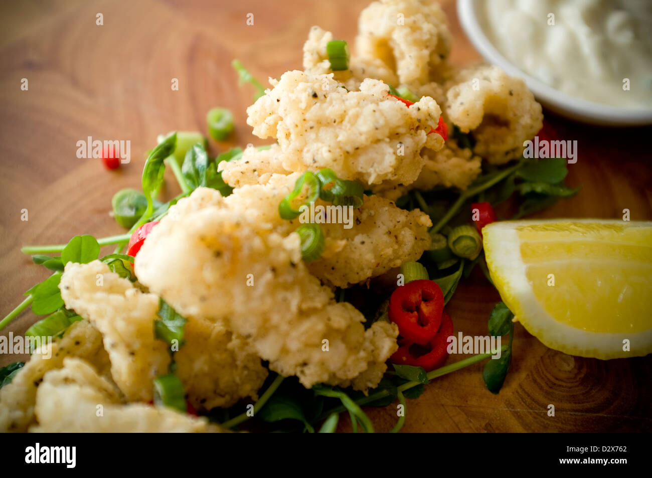 Salt and Pepper Squid Deep fried and served with chillies, spring