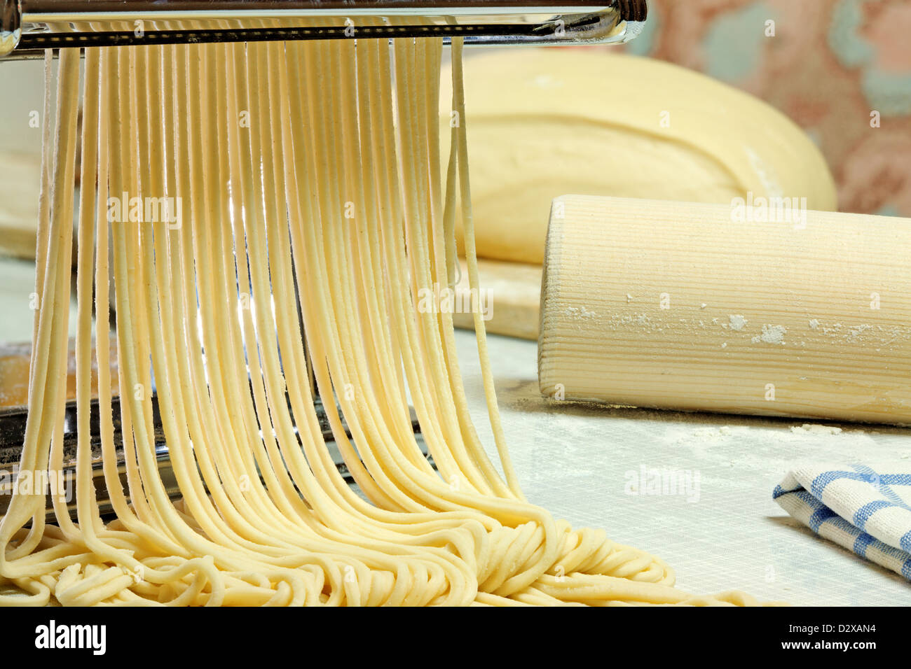 Simple homemade noodles and pasta machine Stock Photo Alamy