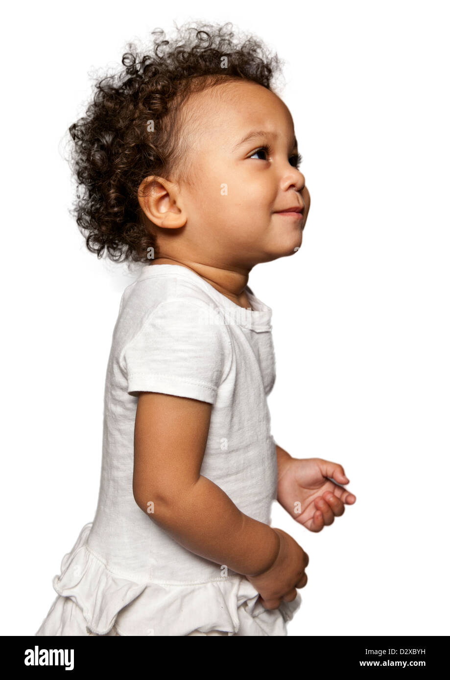 Studio Portraits Of Mixed Race Toddler Girl Wearing A White Vest