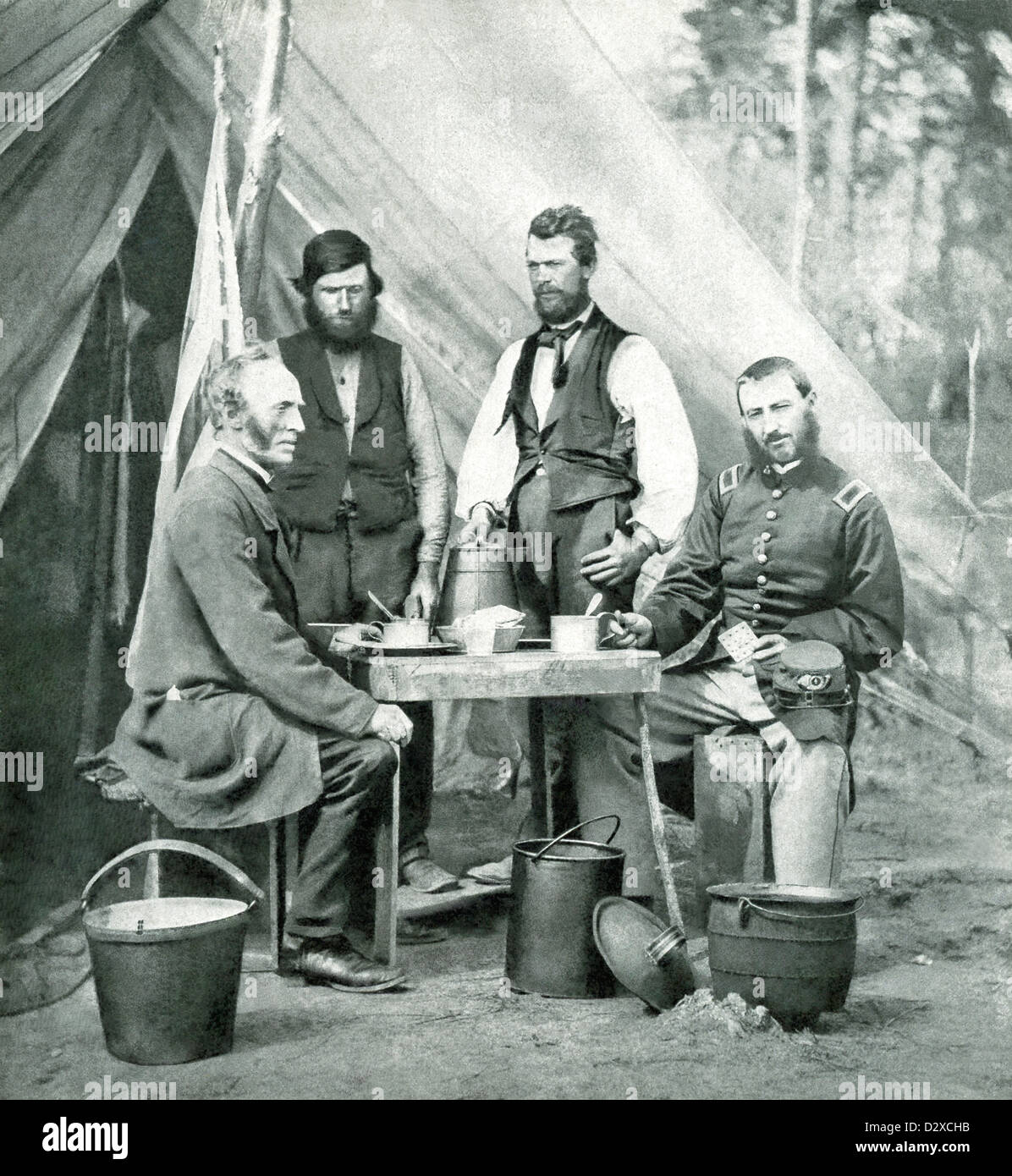 Here, Union men have dinner during the U.S. Civil War at the telegraph tent at Yorktown, Virginia, in May 1862. Stock Photo